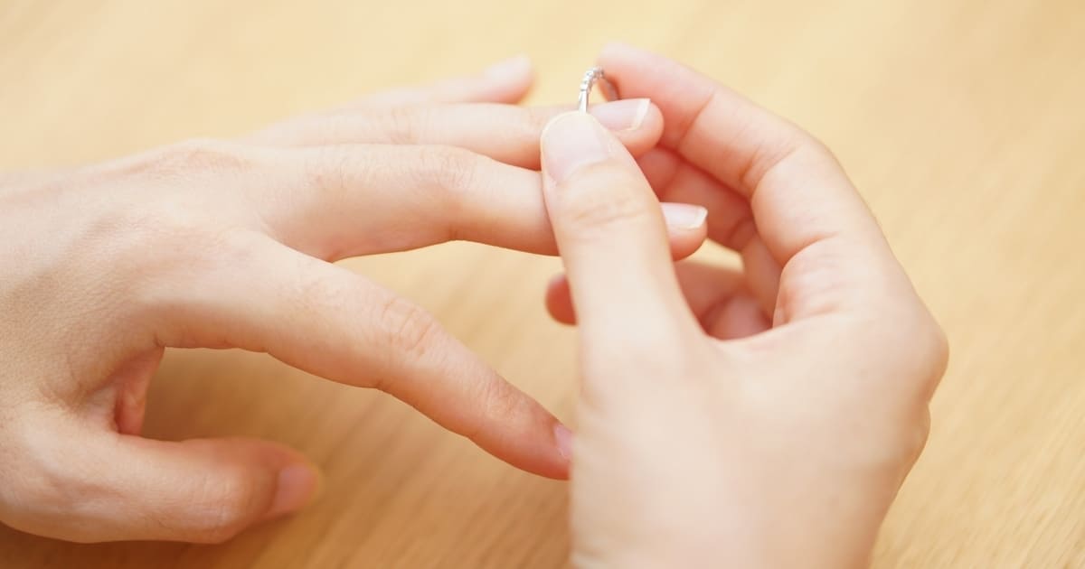 woman-hand-removing-ring